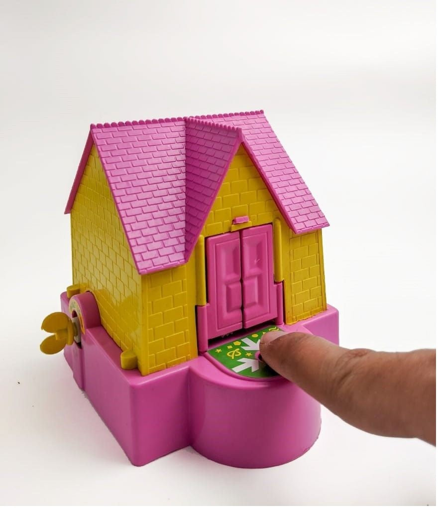 Magic House coin bank